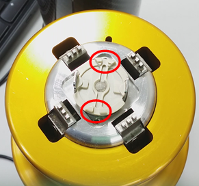 When and how should I clean the lower fluid cell?